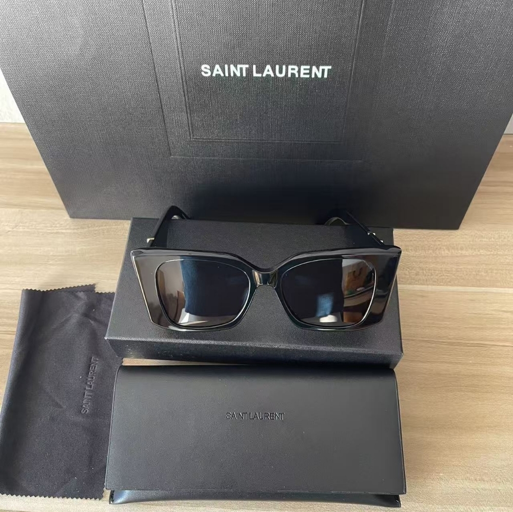 Yves Saint Laurent Black Sunglasses with Gold YSL Emblem